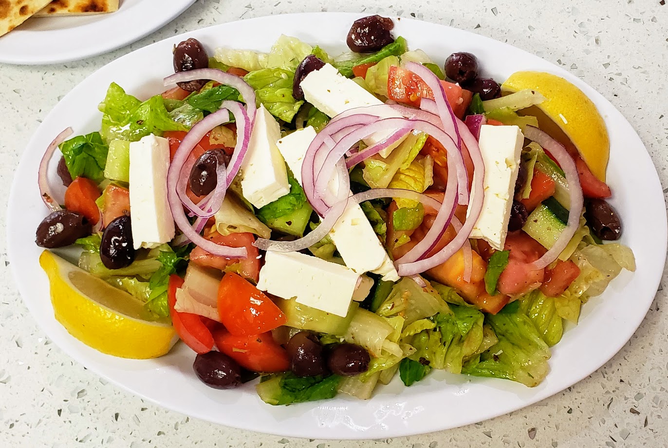 Order Greek Salad food online from Mikonos Grill store, Milpitas on bringmethat.com