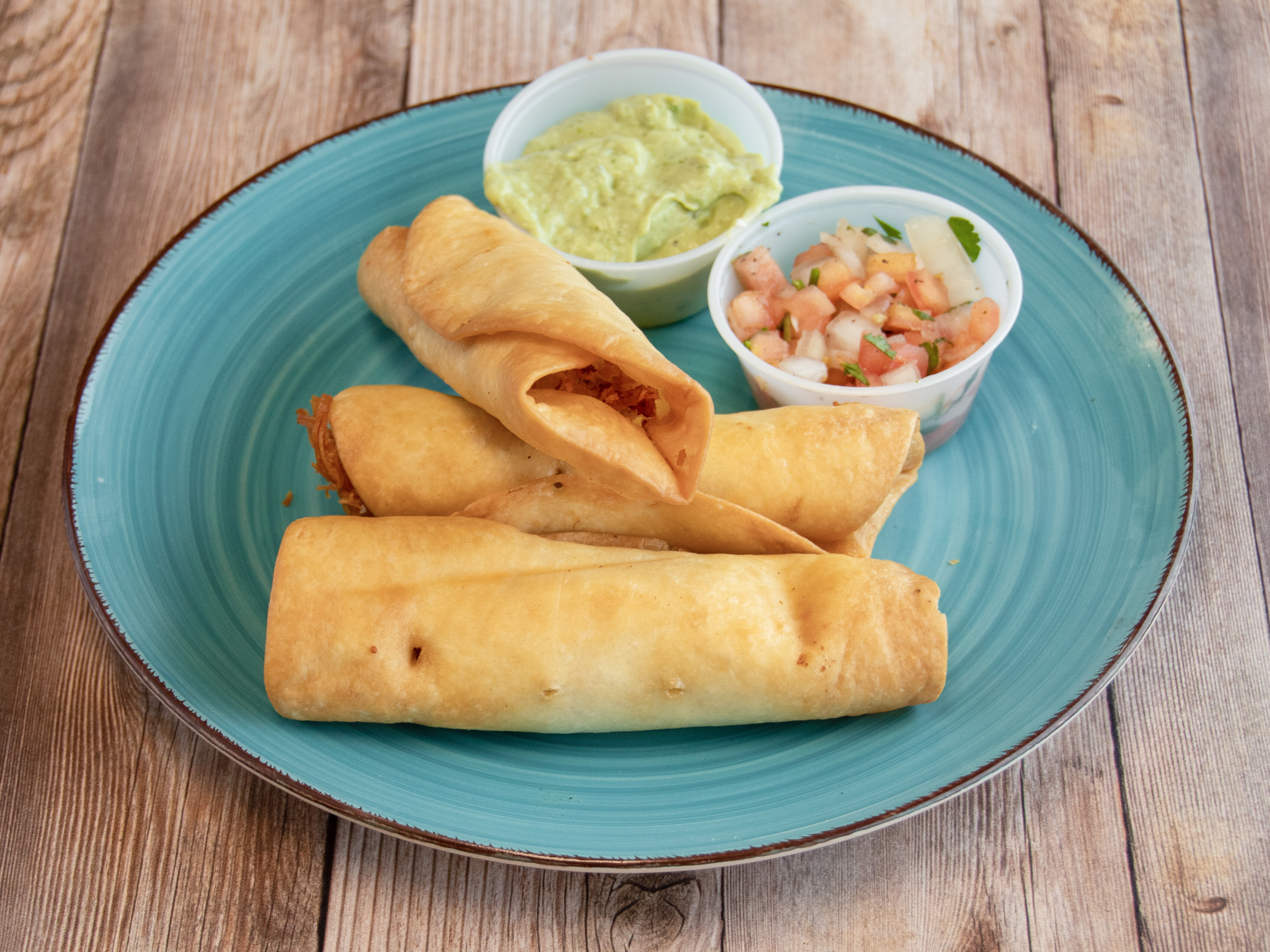 Order Flautas food online from Trini Mexican Carry Out store, New Baltimore on bringmethat.com