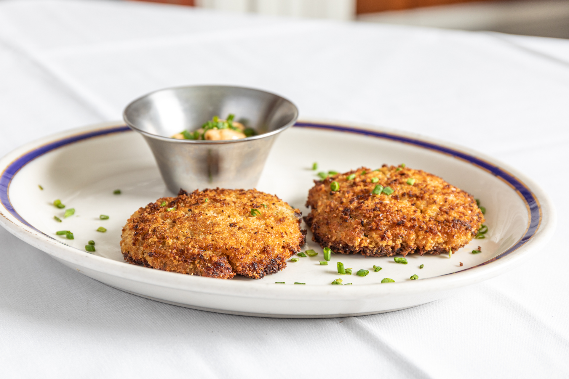 Order Crab Cakes food online from Eric Porter Haus store, Waukesha on bringmethat.com