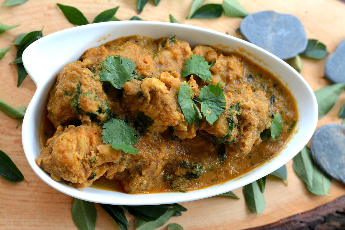 Order Andhra Chicken curry food online from Madras Cafe store, San Diego on bringmethat.com
