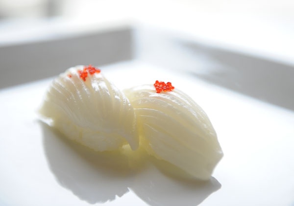 Order Squid Nigiri food online from Asian Fusion store, Kennesaw on bringmethat.com