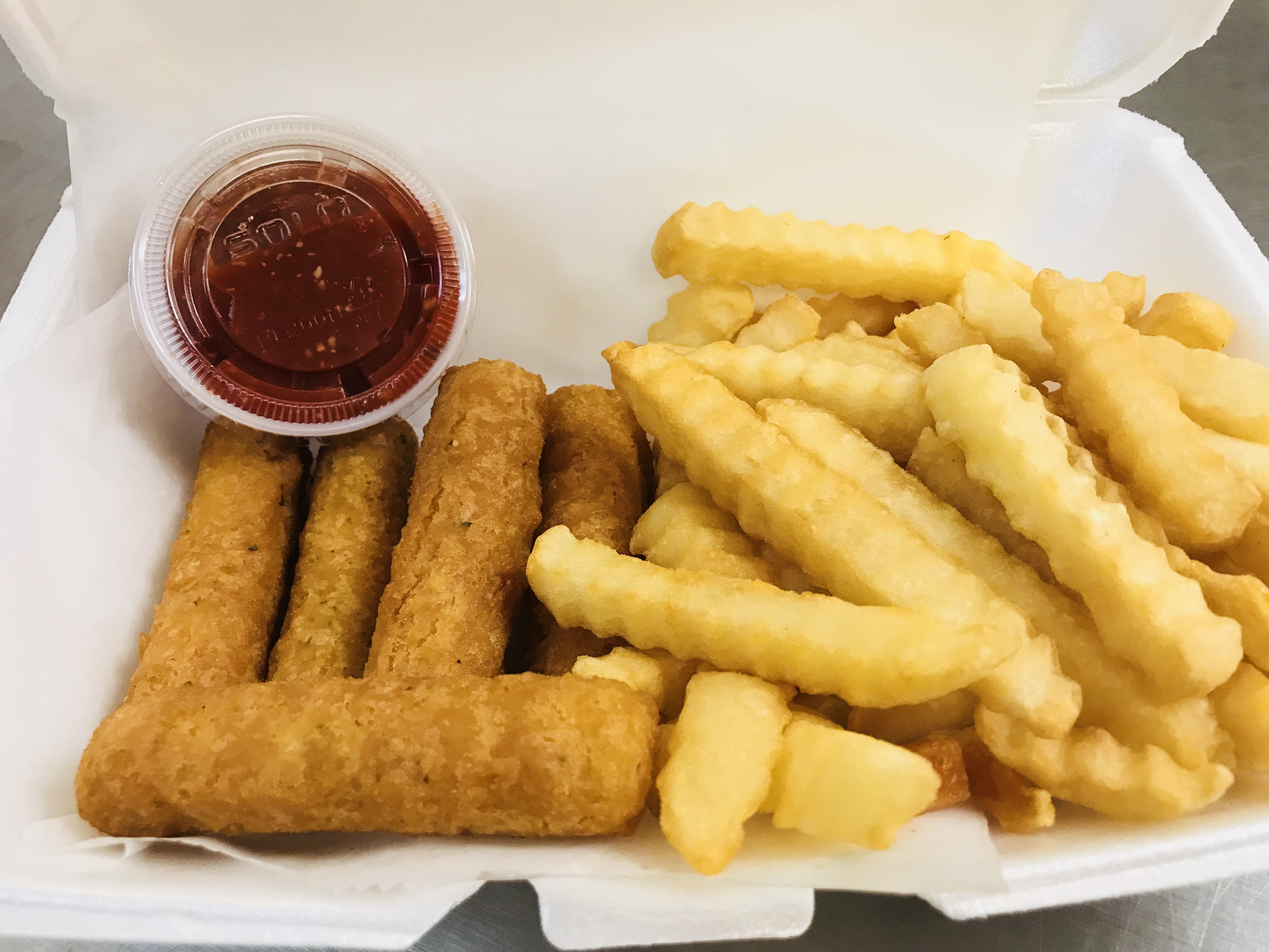 Order 4. Mozzarella Sticks (4 pcs)with Fries food online from A-1 Deli And Fried Chicken store, Wilmington on bringmethat.com