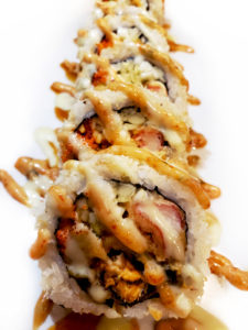 Order 8 Piece Deep Fried Spicy Salmon Roll  food online from Momo Sushi store, Mundelein on bringmethat.com