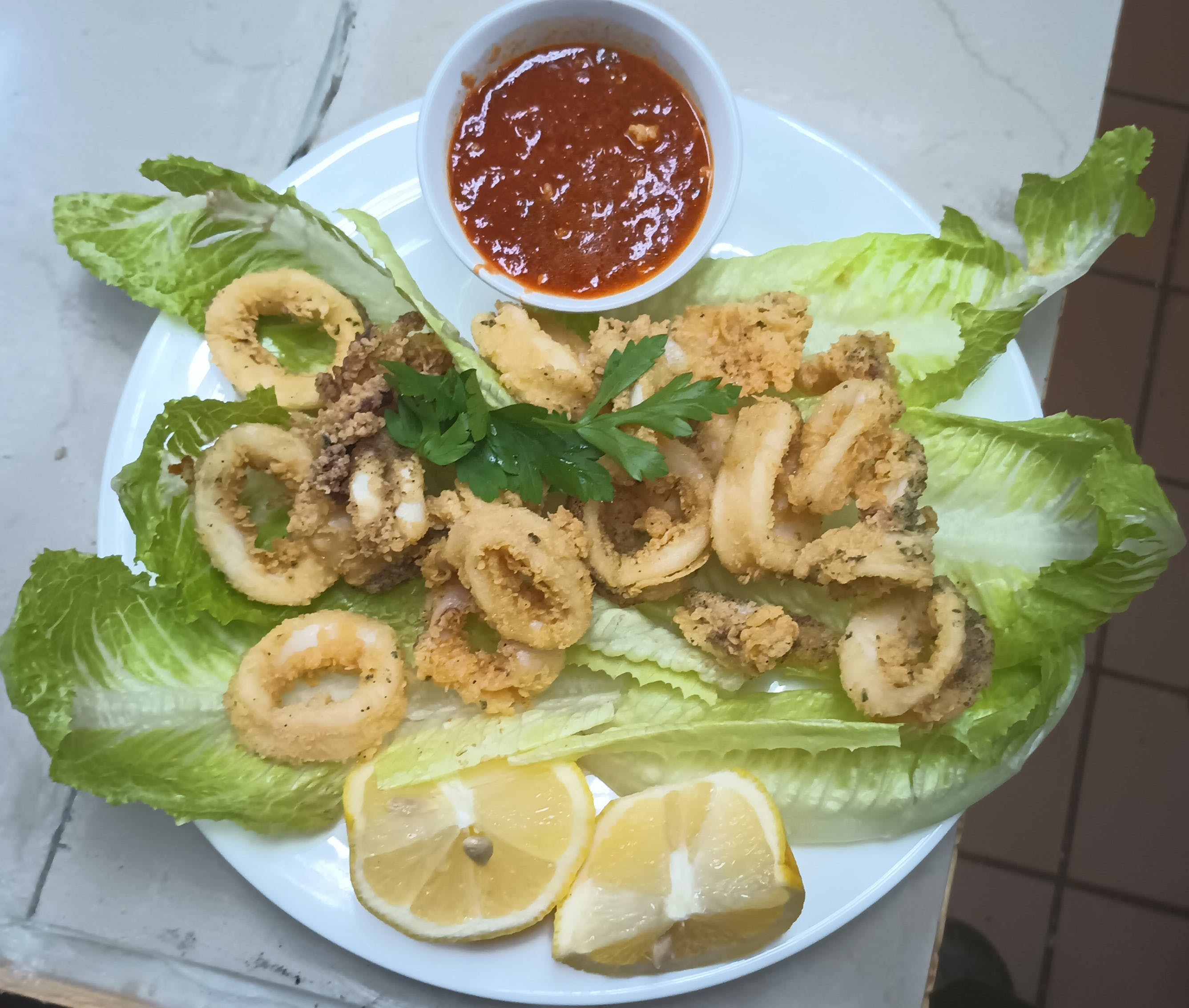 Order Fried Calamari - Appetizer food online from Ciccios Pizza store, Brooklyn on bringmethat.com