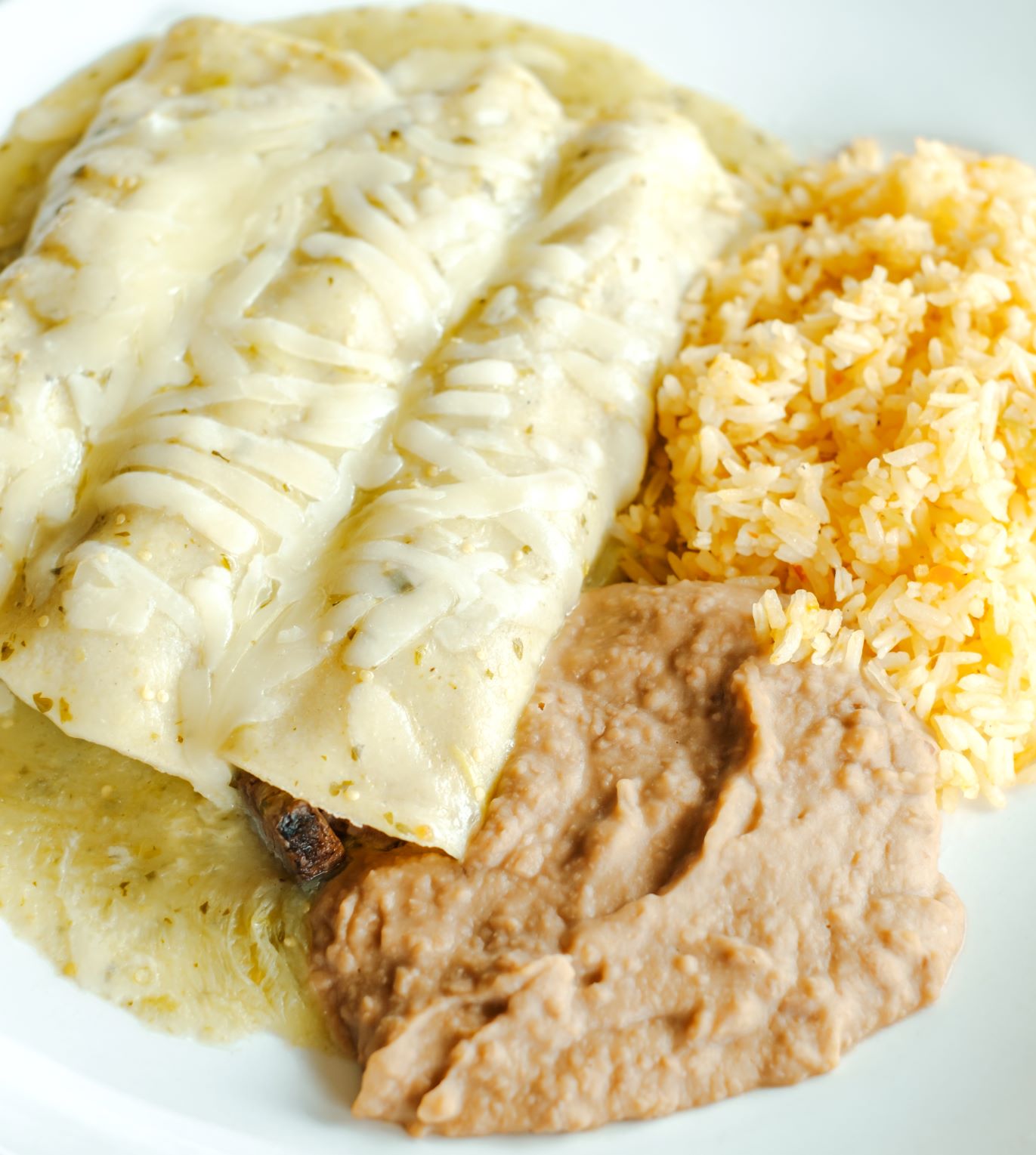 Order Enchiladas Suizas food online from Alicia's Mexican Grille store, Cypress on bringmethat.com