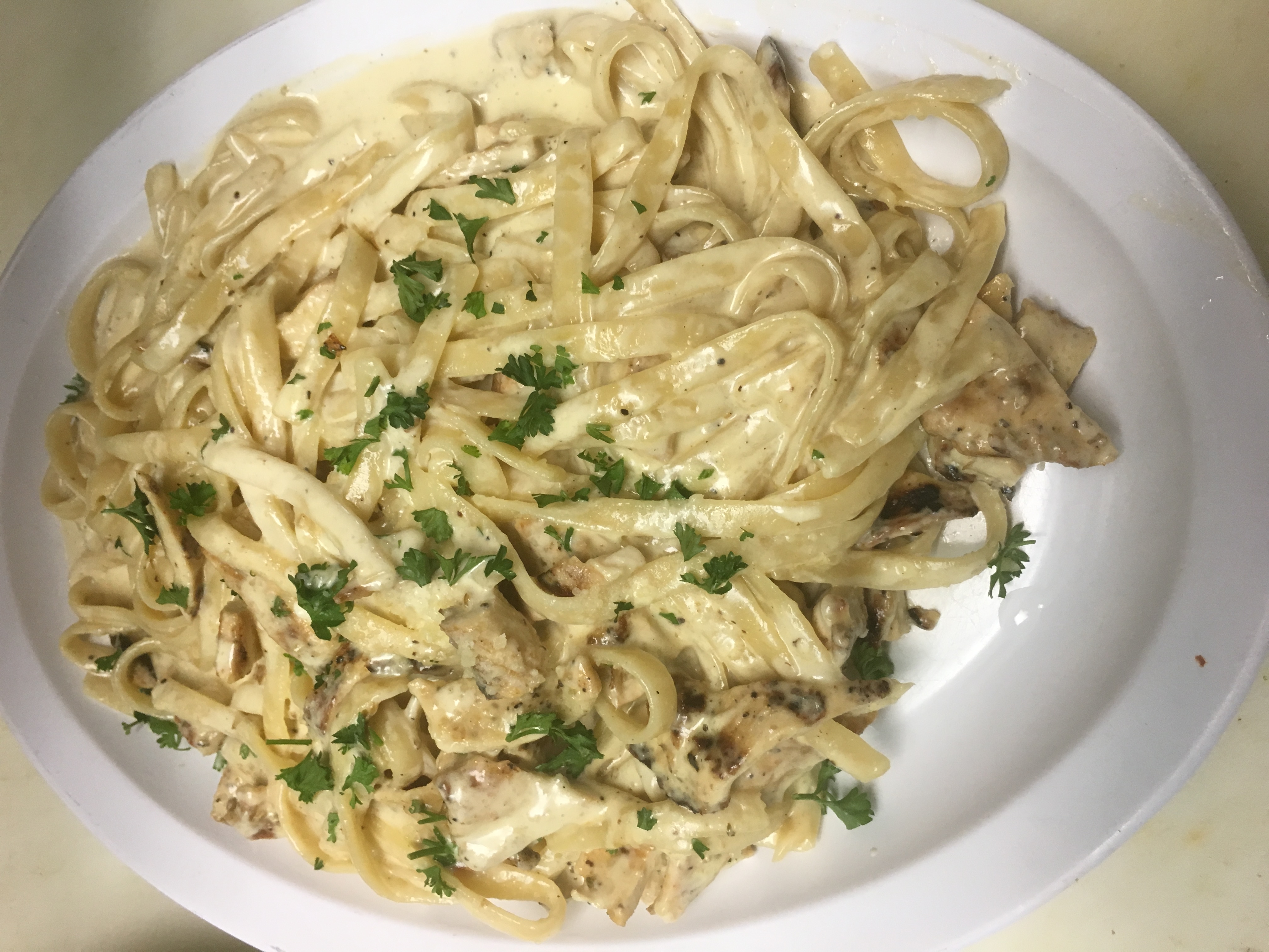 Order Chicken Alfredo over Pasta food online from Slice Pizza And Pasta store, Yonkers on bringmethat.com
