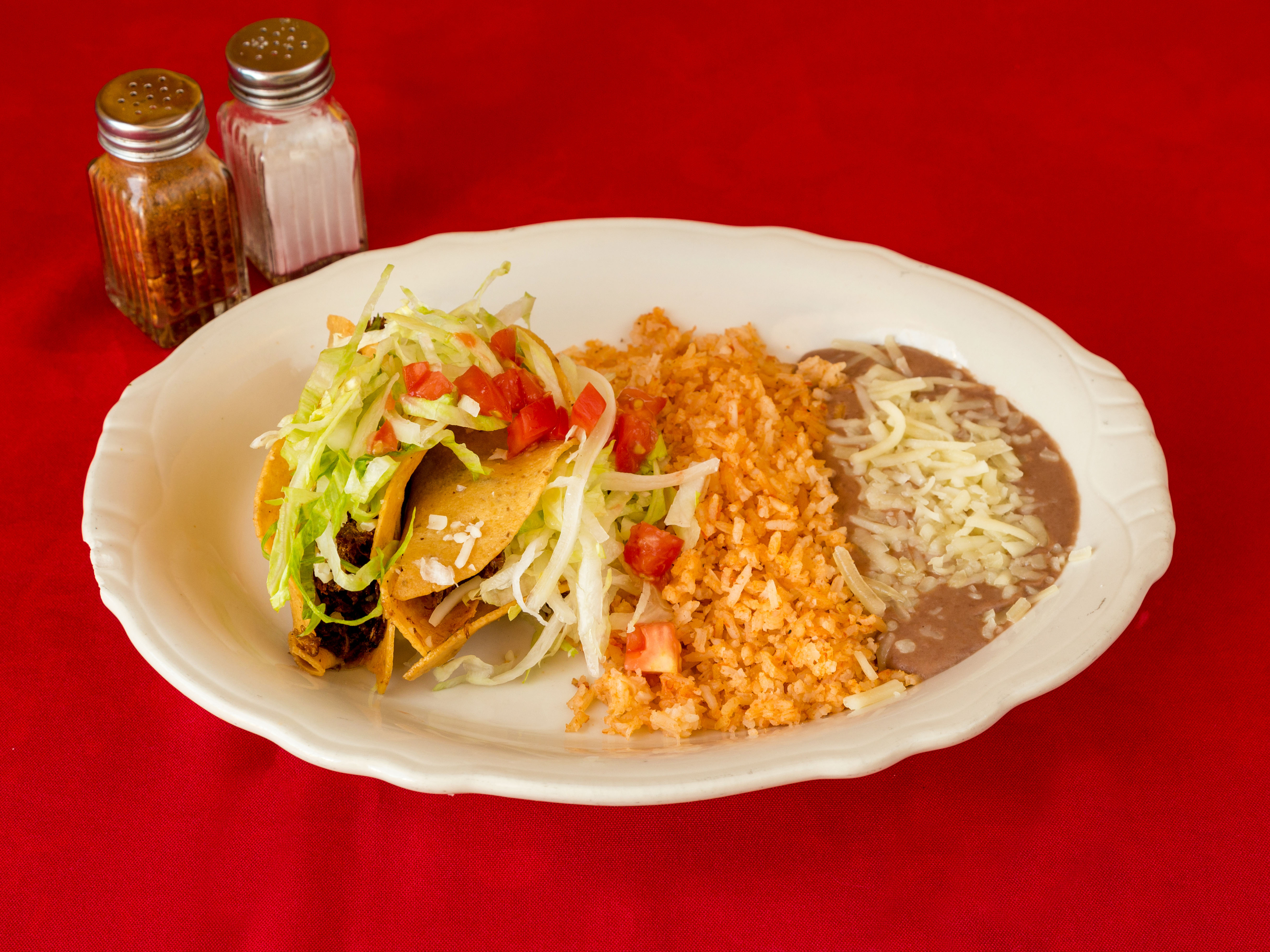 Order 2 Hard Shell Tacos food online from Gayosso's Mexican Food store, Phoenix on bringmethat.com