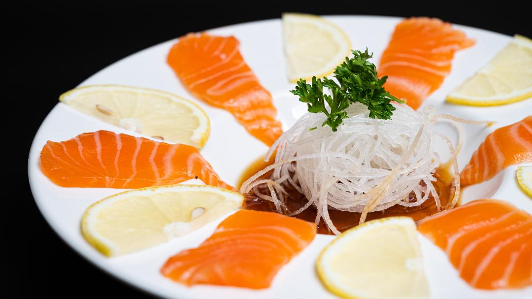 Order Salmon Carpaccio (6 pcs) food online from Jin Sushi store, Downey on bringmethat.com