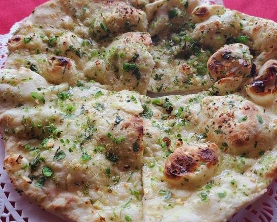Order Garlic Chilly Naan food online from Rajput Indian Cuisine store, Norfolk on bringmethat.com