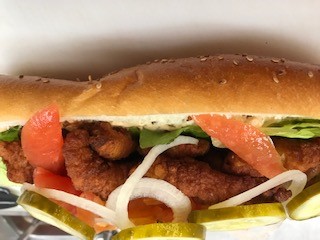 Order Clam Strip Po Boy Sandwich food online from Barb Cajun Seafood Company store, Philadelphia on bringmethat.com