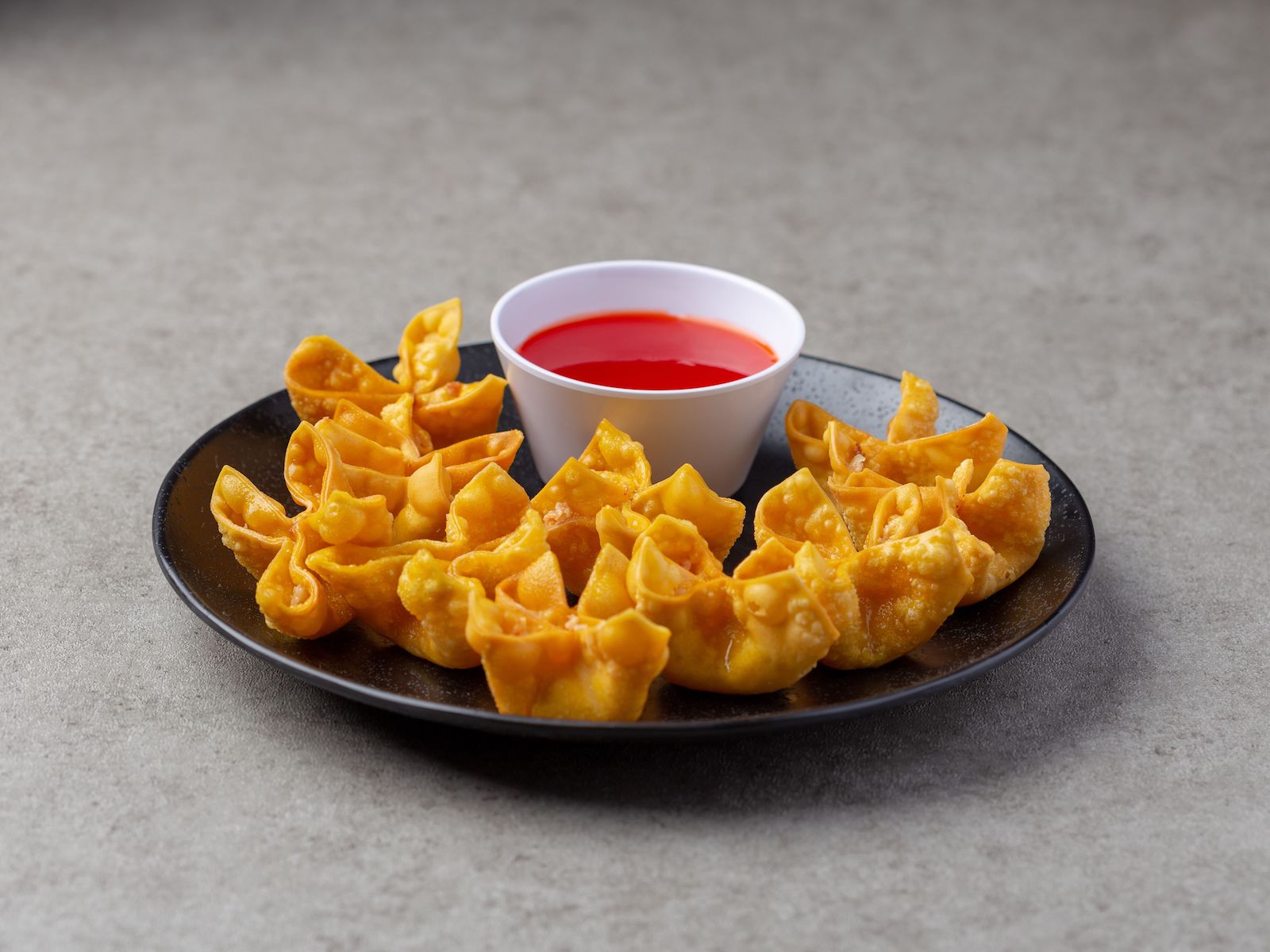Order 13. Crab Rangoon food online from China Garden store, Rochester on bringmethat.com