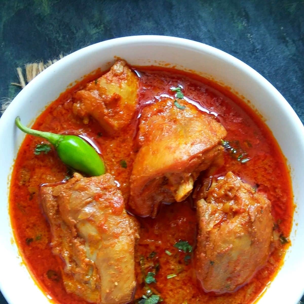 Order Andhra Chicken Curry food online from Cafe Captain Cook store, Tempe on bringmethat.com