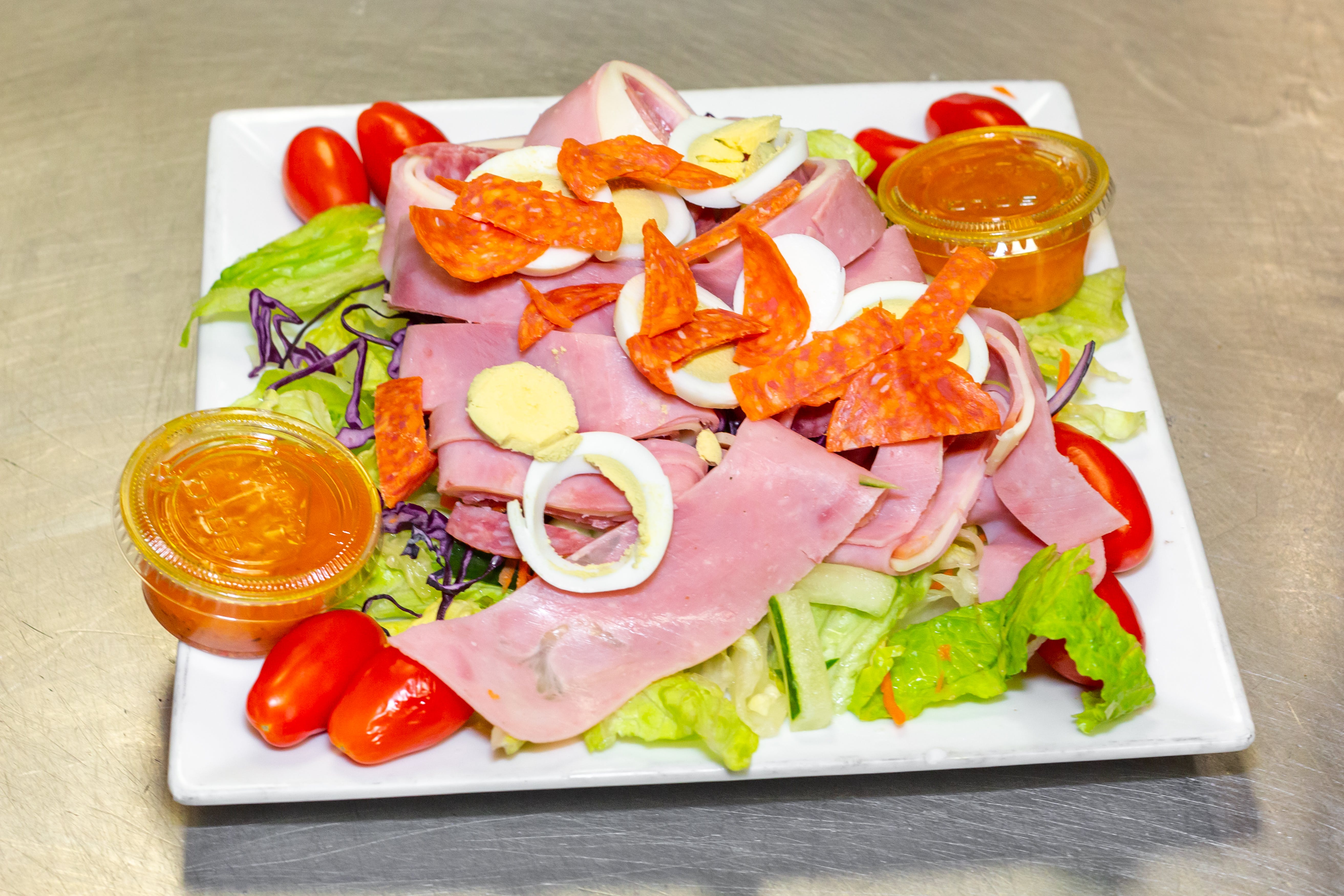 Order Antipasto Salad - Salad food online from Amalfi Pizza store, Newark on bringmethat.com