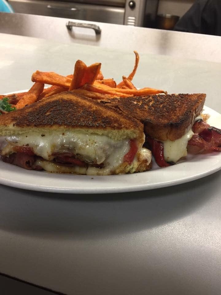 Order Grilled Reuben Sandwich - Sandwiches & Wraps food online from Fat Cat Grill & Bar store, Norwich on bringmethat.com