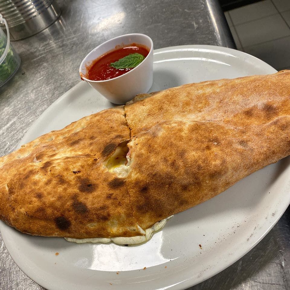 Order Calzone - Calzone food online from Se7te Woodfire Pizza store, Totowa on bringmethat.com