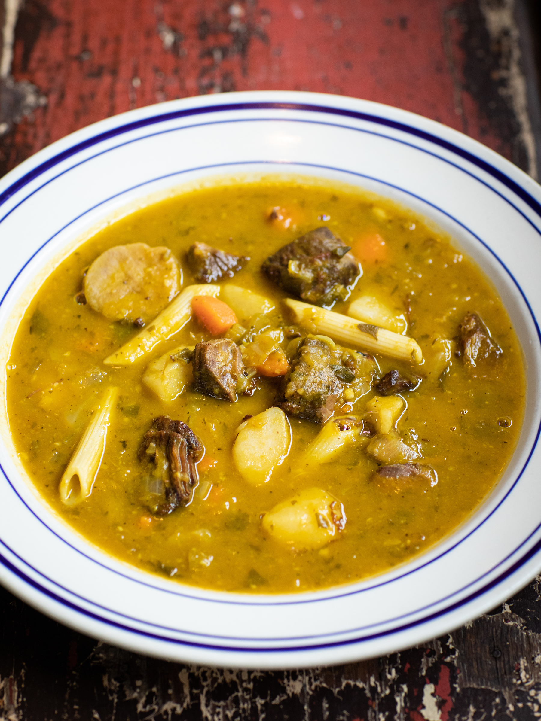 Order Soup Joumou (32 Ounces) food online from Grandchamps store, Brooklyn on bringmethat.com