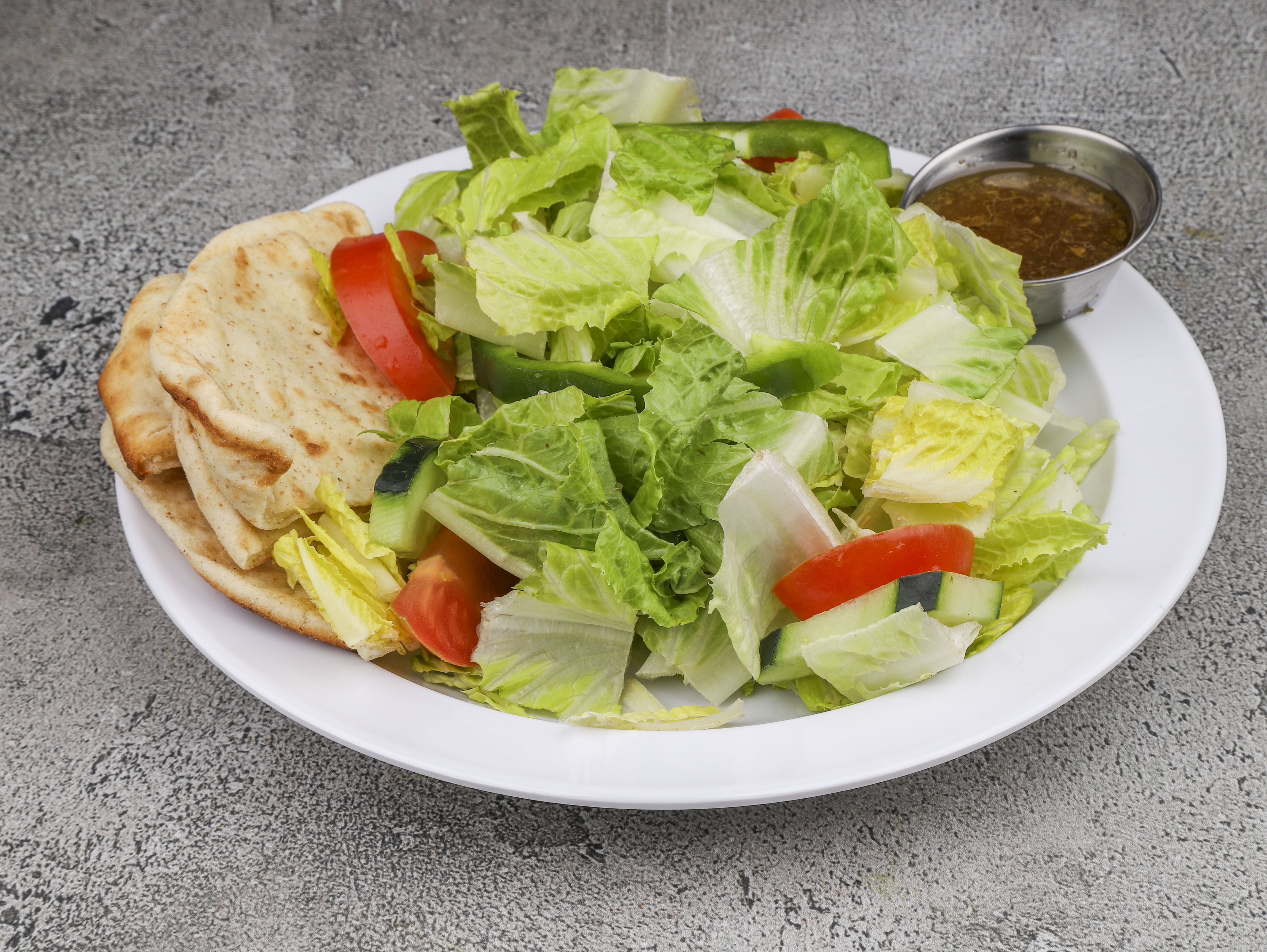 Order Greek Salad food online from International Delights store, Durham on bringmethat.com