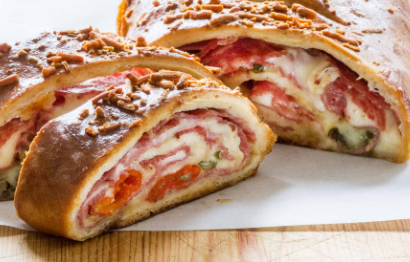 Order Deluxe Calzone food online from Husson Pizza store, Charleston on bringmethat.com