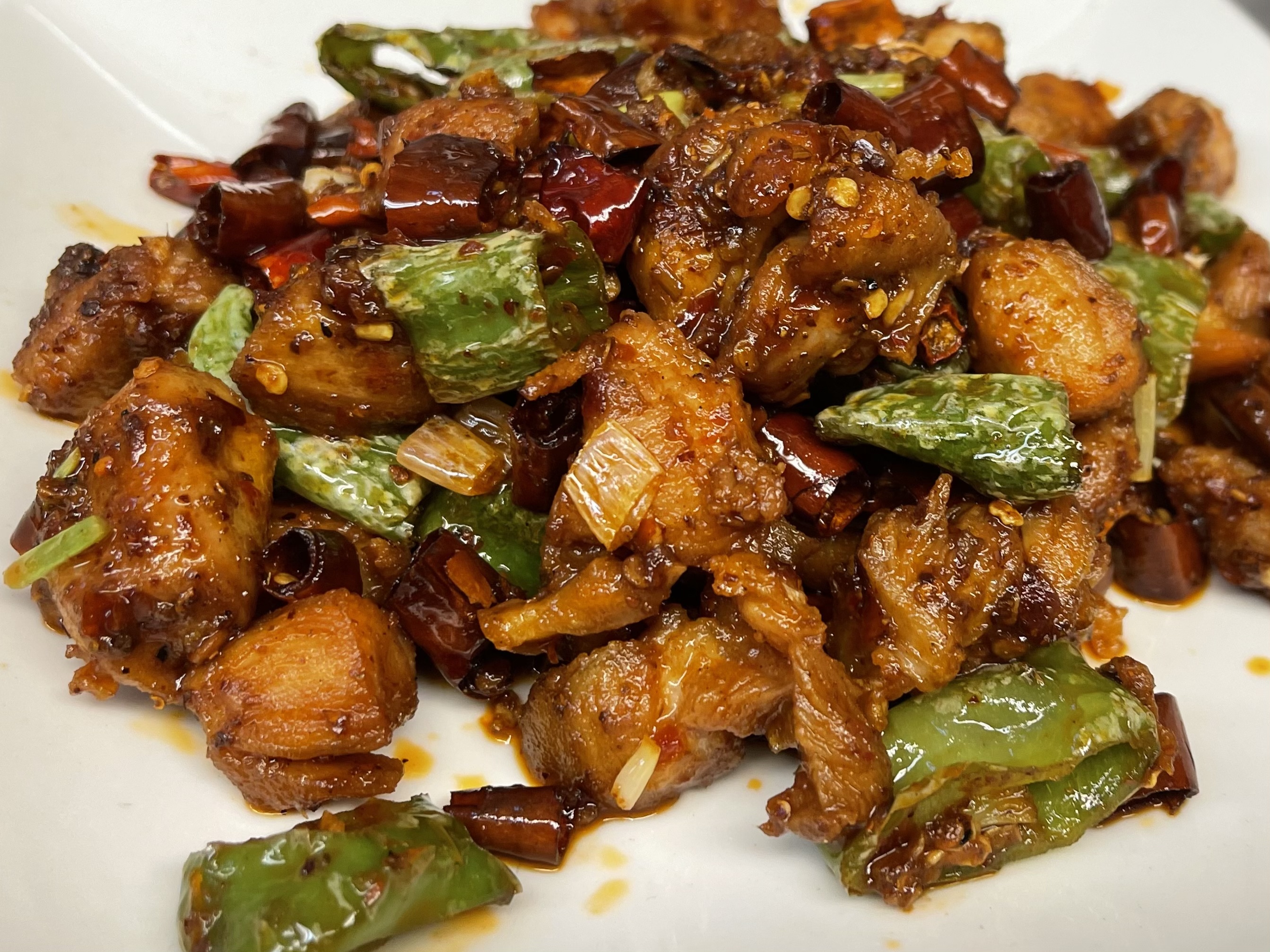 Order 513. Stir-Fried Chicken with Roasted Chili and Asian Green Chili food online from Land Of Plenty store, New York on bringmethat.com