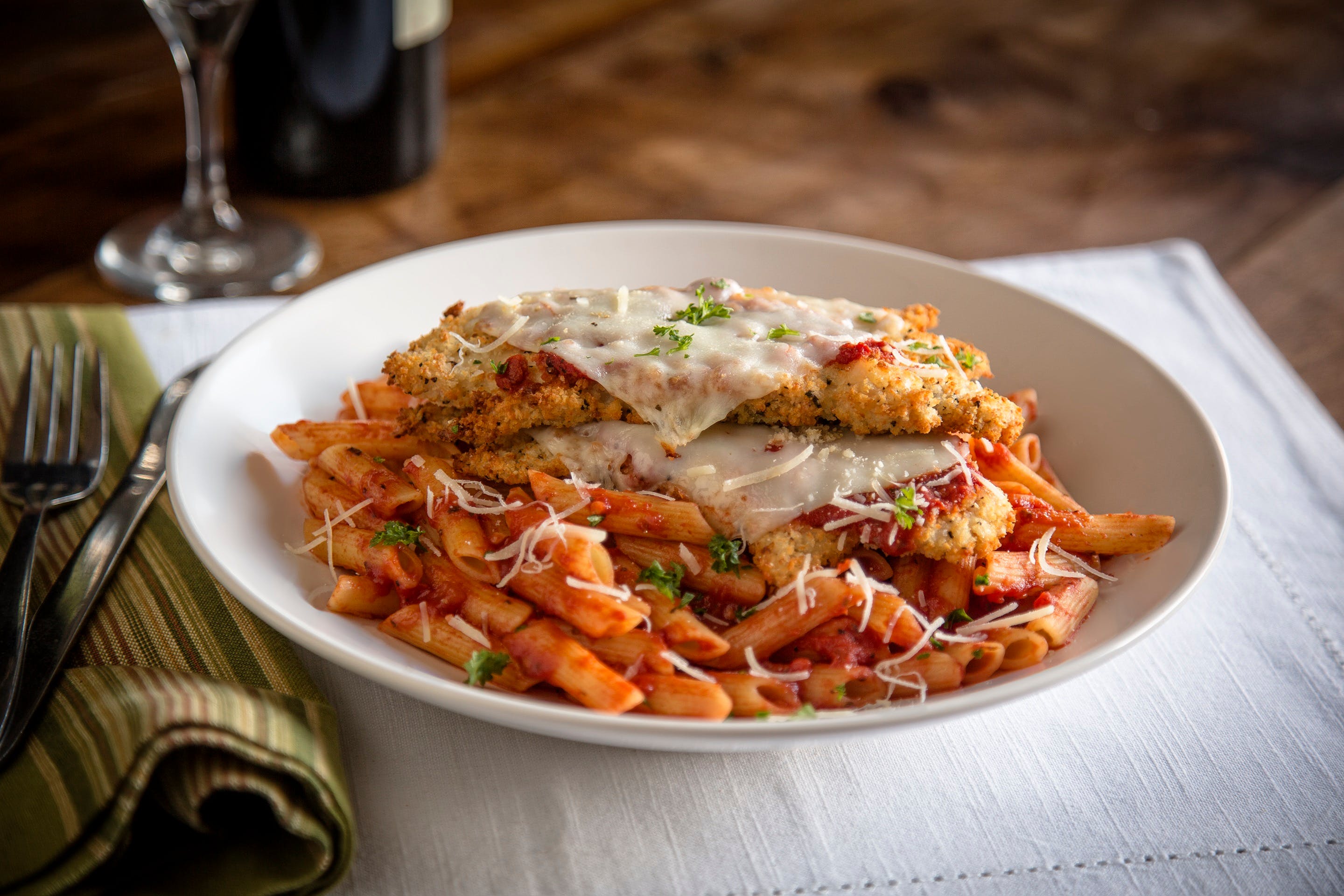 Order Romano-Crusted Chicken Parmesan - Entree food online from Uno Pizzeria & Grill store, Birch Run on bringmethat.com