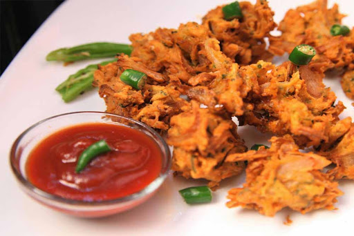 Order Onion Pakoda food online from Ruchi Indian Restaurant store, Bellevue on bringmethat.com