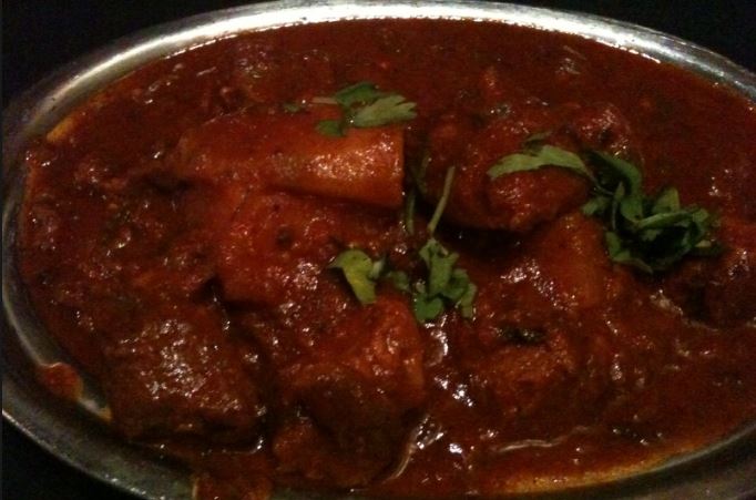 Order Goat Kadai food online from Curry India store, New York on bringmethat.com