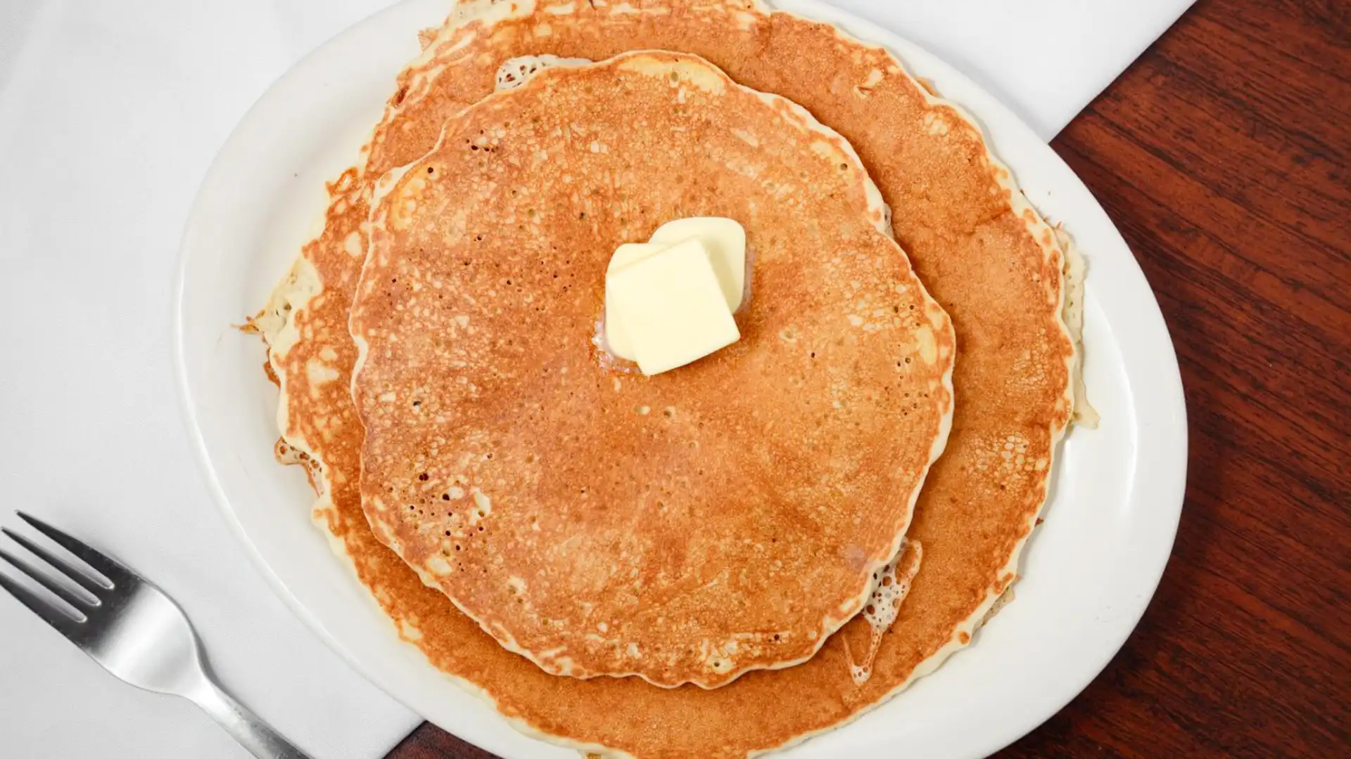 Order Stack of 3 Pancakes food online from Crazy Otto Diner store, Valencia on bringmethat.com