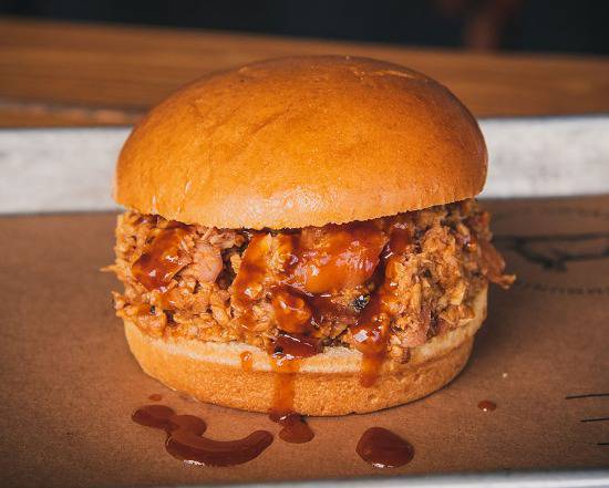 Order Pulled Chicken Sandwich food online from 4 Rivers Smokehouse store, Orange Park on bringmethat.com