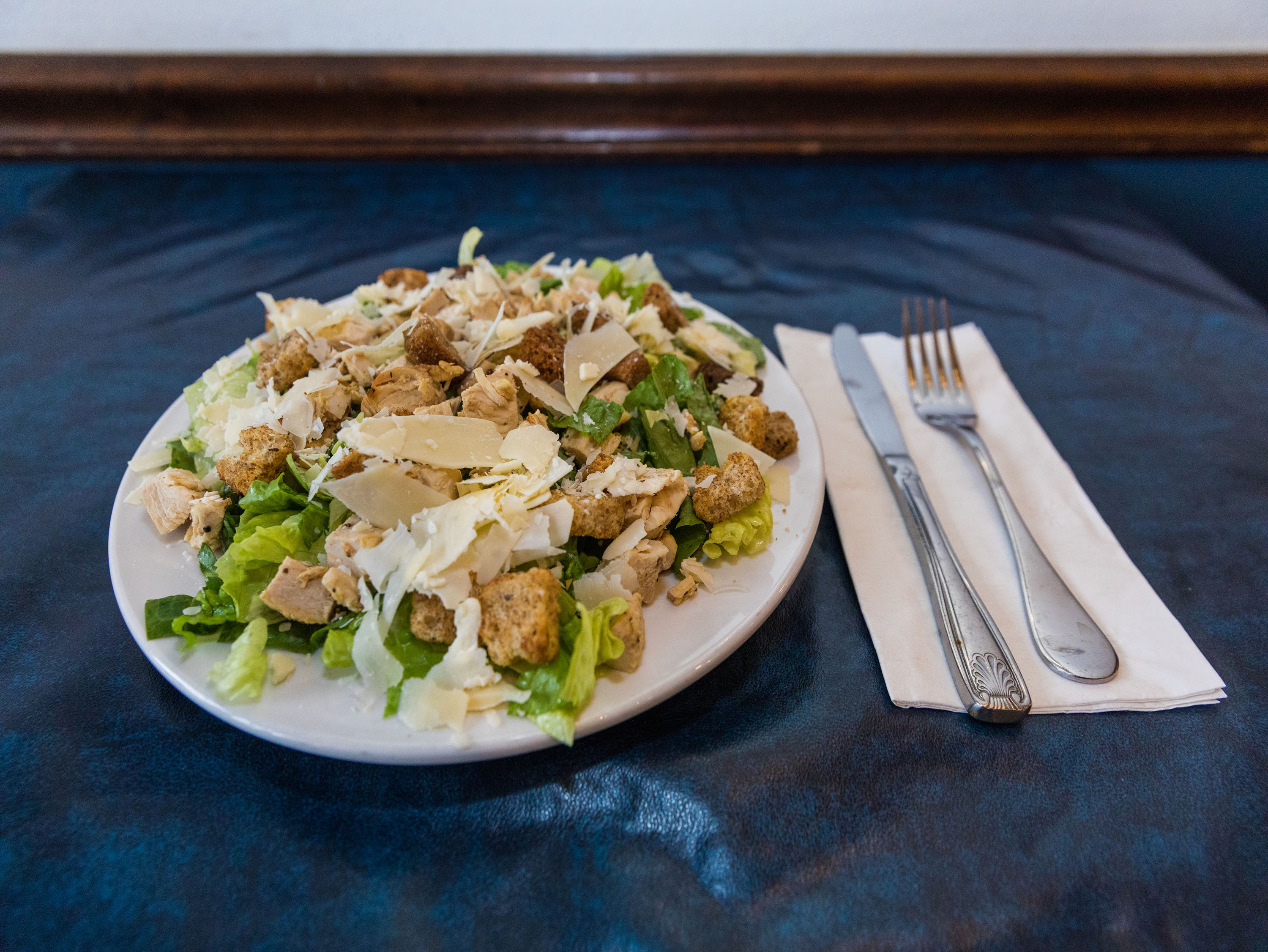 Order Chicken Caesar Salad food online from Bluffington's Cafe store, Lake Bluff on bringmethat.com