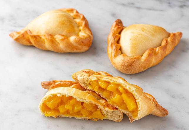 Order Pineapple Empanada food online from Porto's Bakery & Cafe store, Downey on bringmethat.com