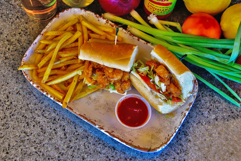 Order Lunch Shrimp Po’ Boy food online from Voodoo Daddy Steam Kitchen store, Tempe on bringmethat.com