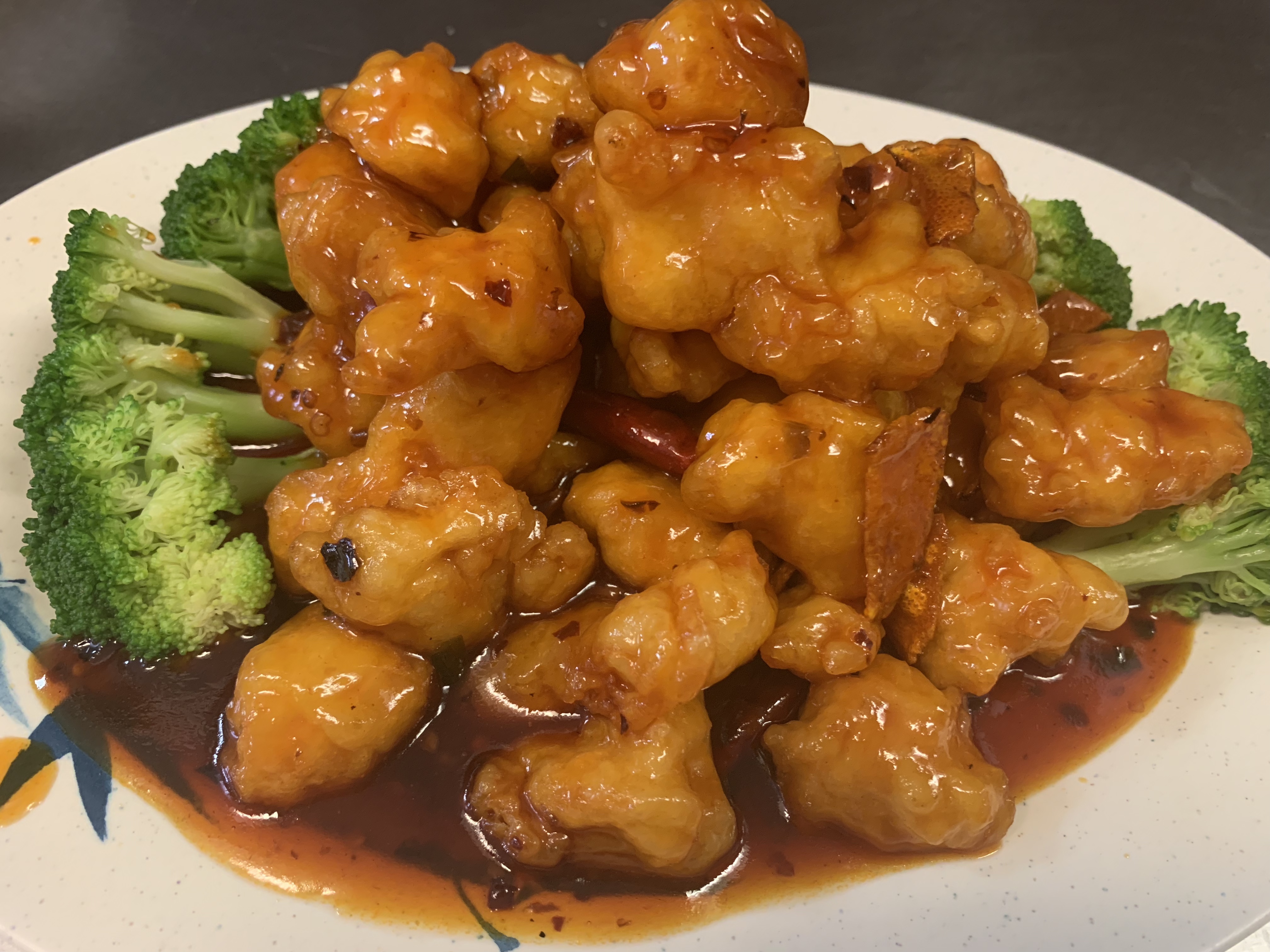 Order H4. Orange Chicken food online from Tsing Tao Chinese Cuisine store, Mesa on bringmethat.com