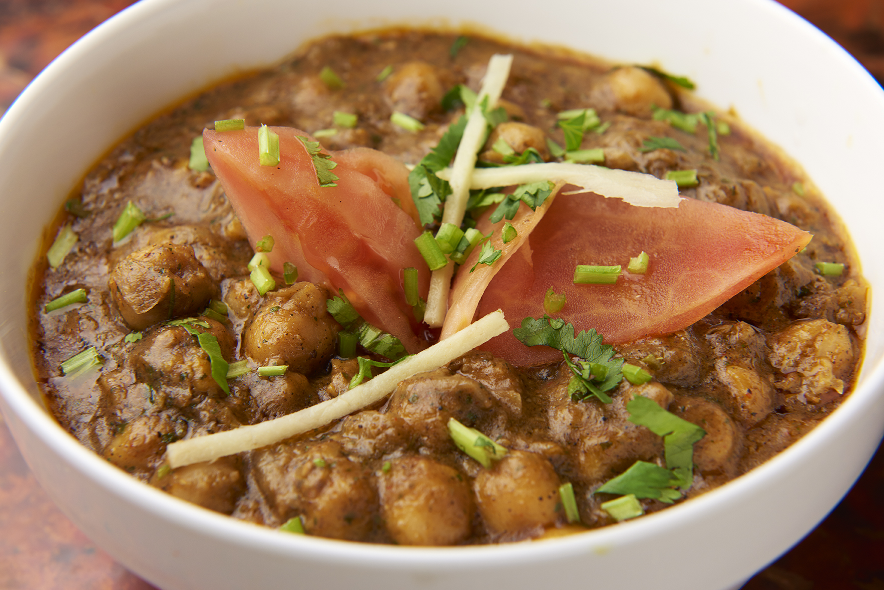 Order “Ambarsaria” Chana Massala food online from Spice Culture store, South Plainfield on bringmethat.com