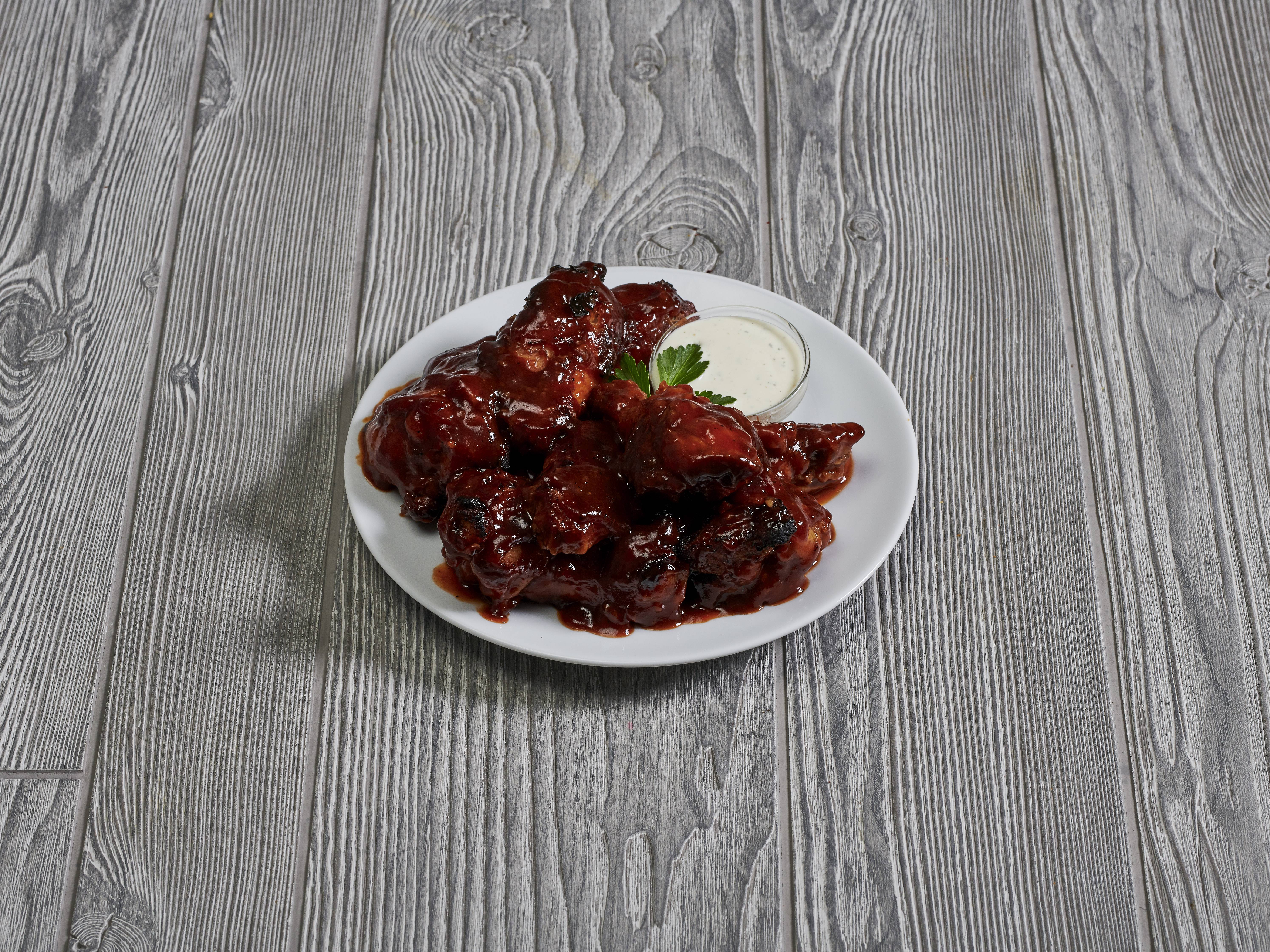 Order Dyno-Mild BBQ Wings food online from Louies Pizza store, Colorado Springs on bringmethat.com