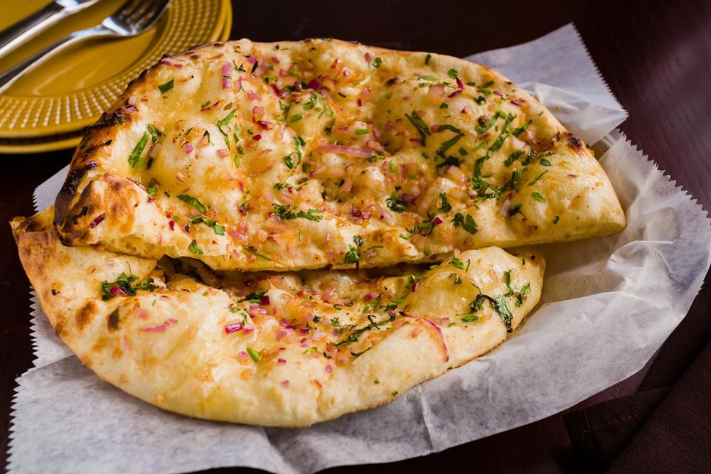 Order Onion Kulcha food online from Dhaba indian cuisine store, New York on bringmethat.com