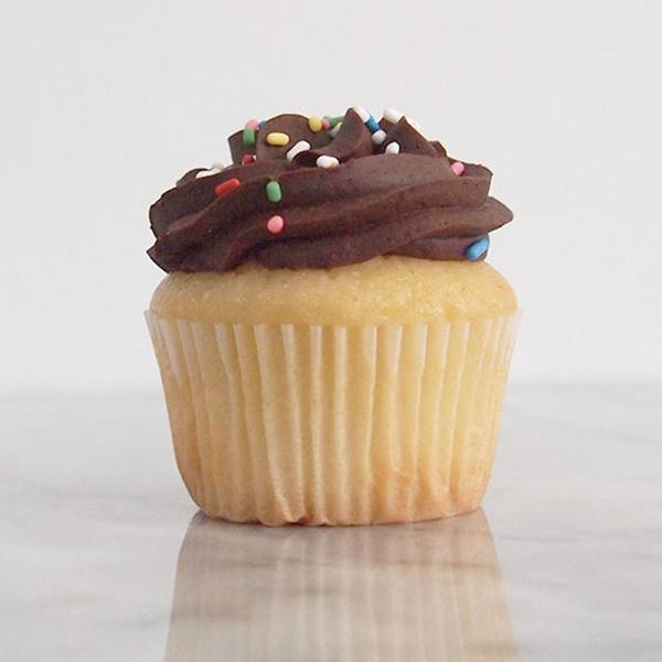 Order Vanilla Cupcake with Chocolate Buttercream food online from Baked Cravings store, New York on bringmethat.com