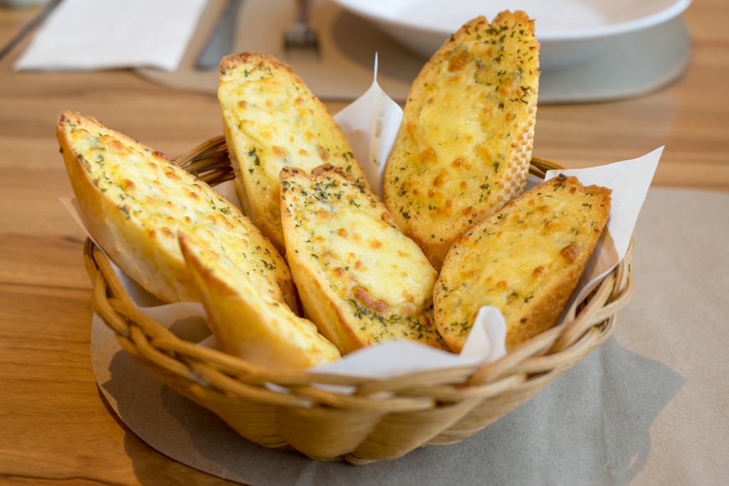 Order 4 Cheese Garlic Bread food online from Supreme Cheesy Breads & More store, Ann Arbor on bringmethat.com