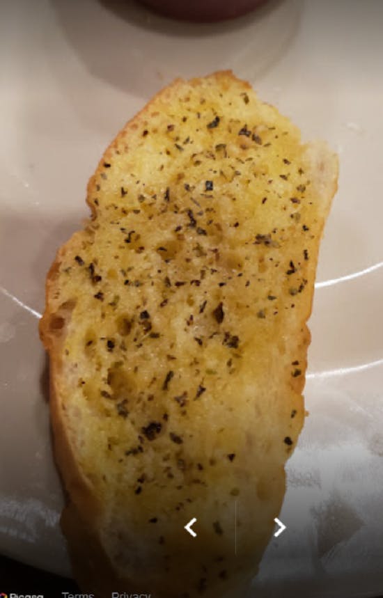 Order Garlic Bread - 4 Pieces food online from Pizza Garden store, Manitowoc on bringmethat.com