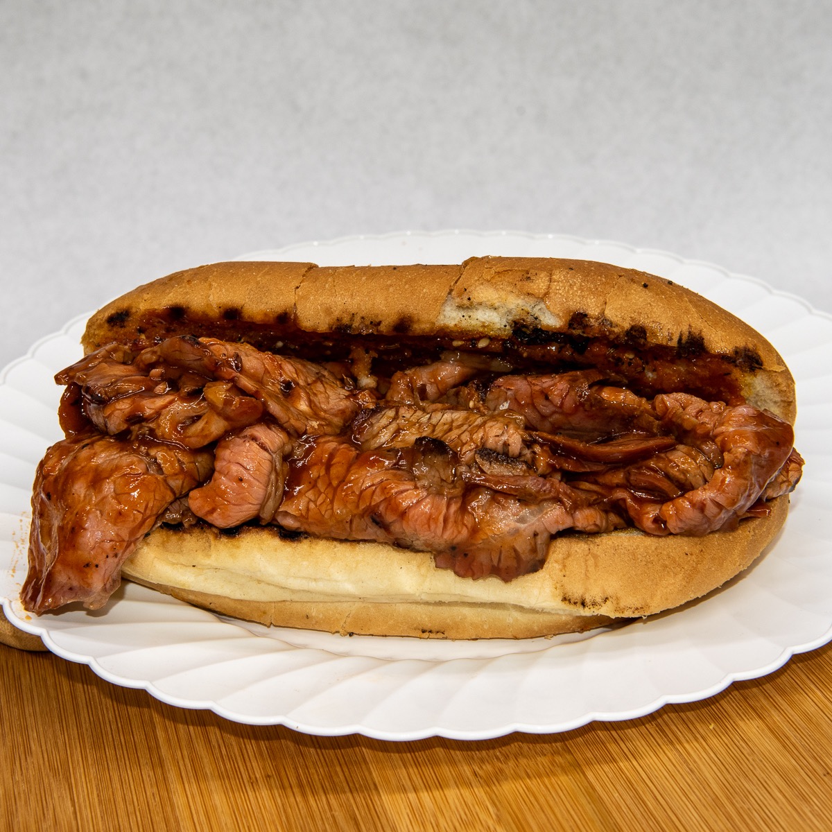 Order BBQ Beef Sandwich food online from Green Acres Market store, Simi Valley on bringmethat.com