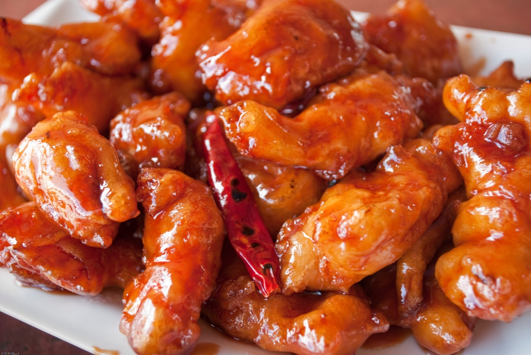 Order Orange Chicken food online from Kung Pao Bistro store, West Hollywood on bringmethat.com