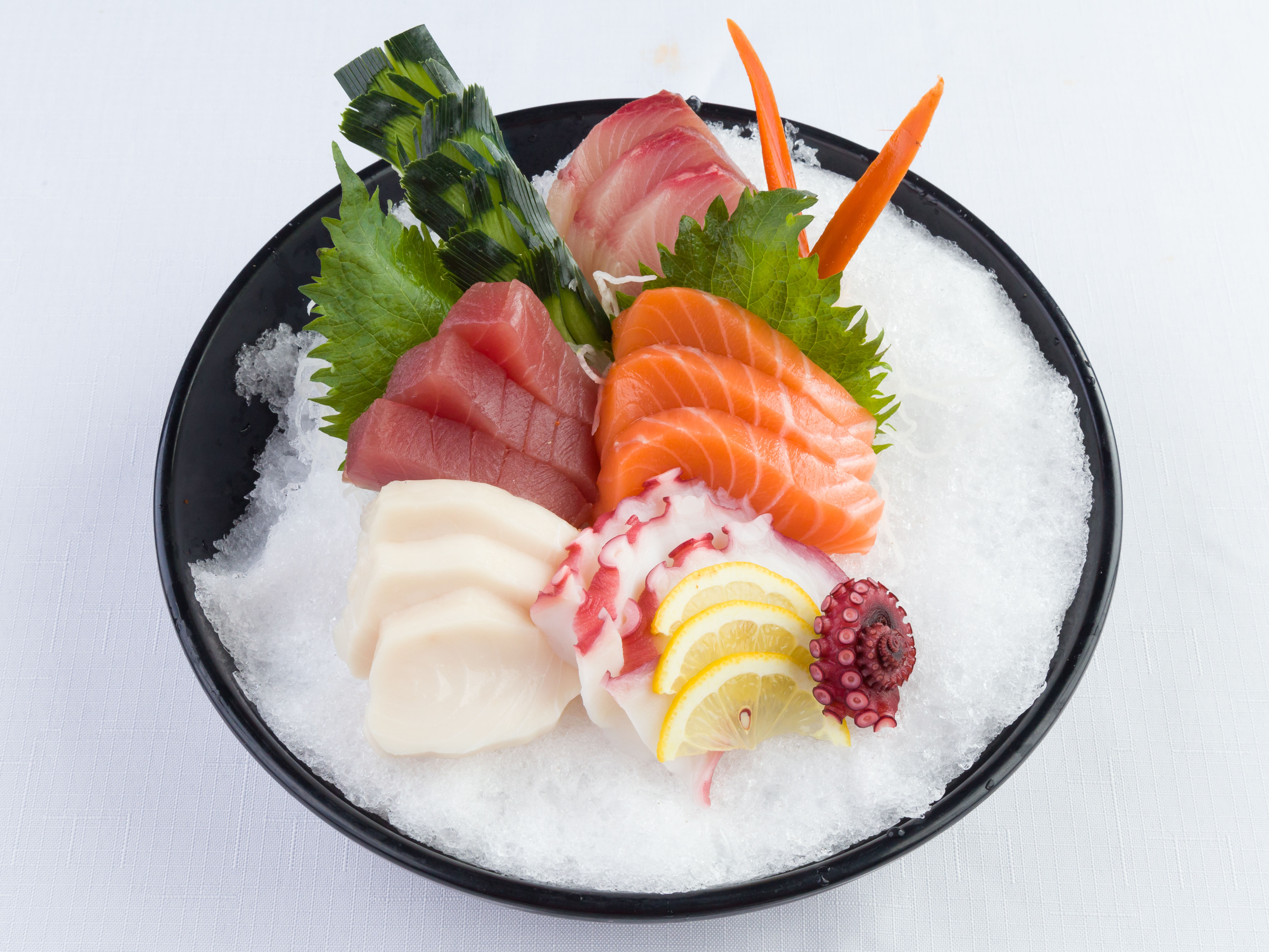 Order Sashimi Deluxe food online from Miyabi Sushi Japanese Restaurant store, Houston on bringmethat.com