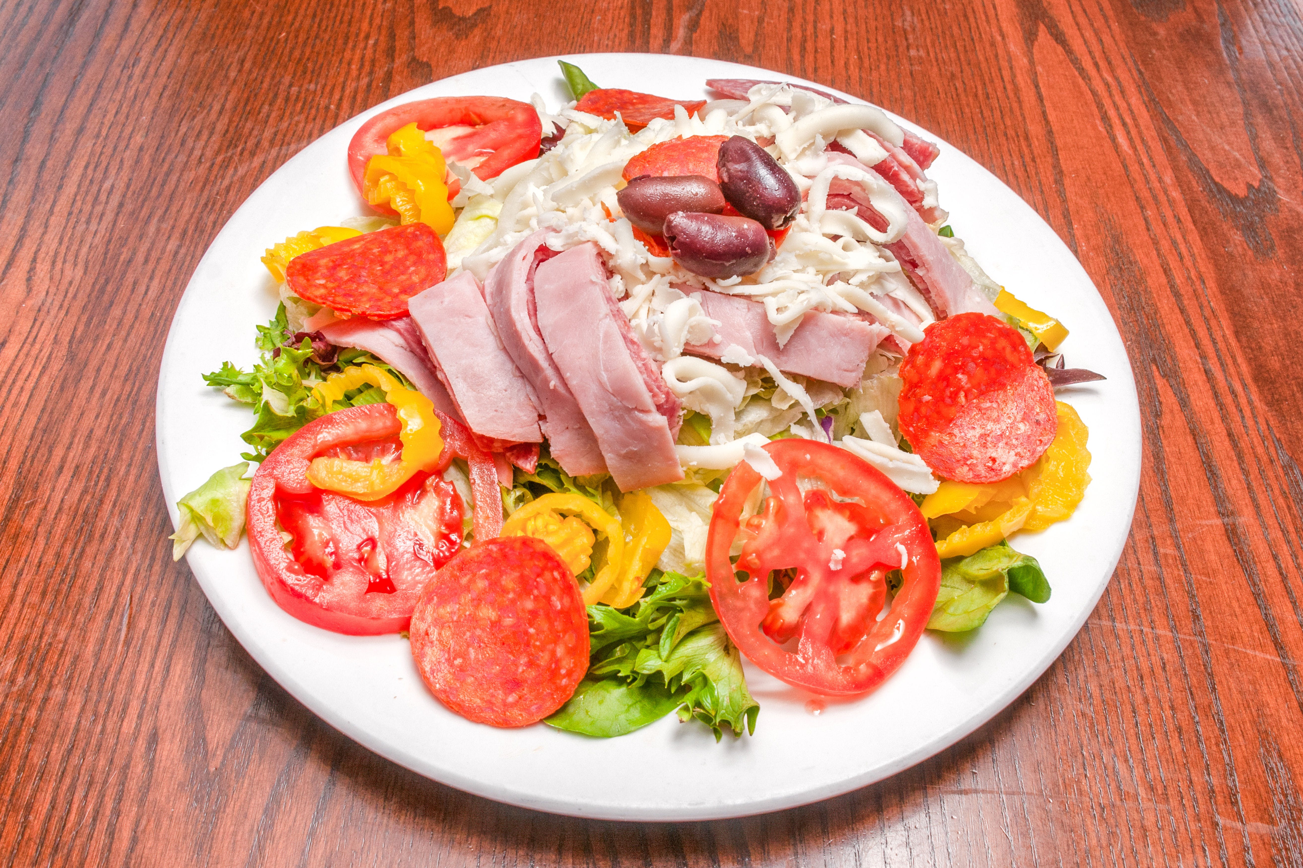 Order Antipasto Salad - Salad food online from Primo Pizza Ny Style store, Cary on bringmethat.com