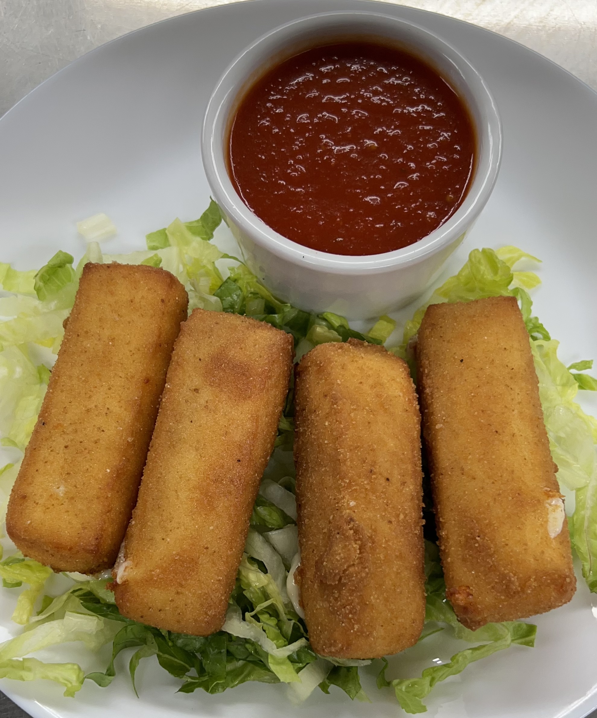 Order Mozzarella Sticks with Marinara Sauce food online from Cappuccino Cafe store, Brooklyn on bringmethat.com