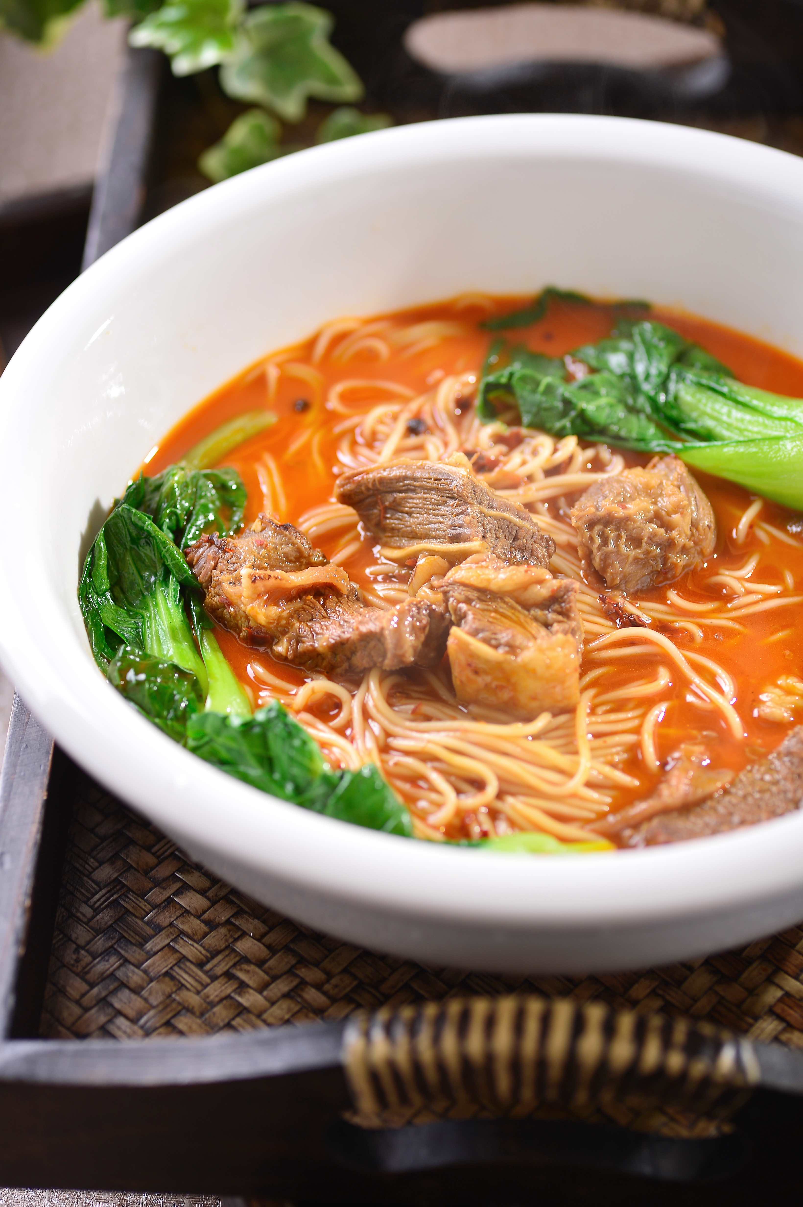 Order 52. Szechuan Spicy Beef Noodle Soup food online from Peter Chang store, Glen Allen on bringmethat.com