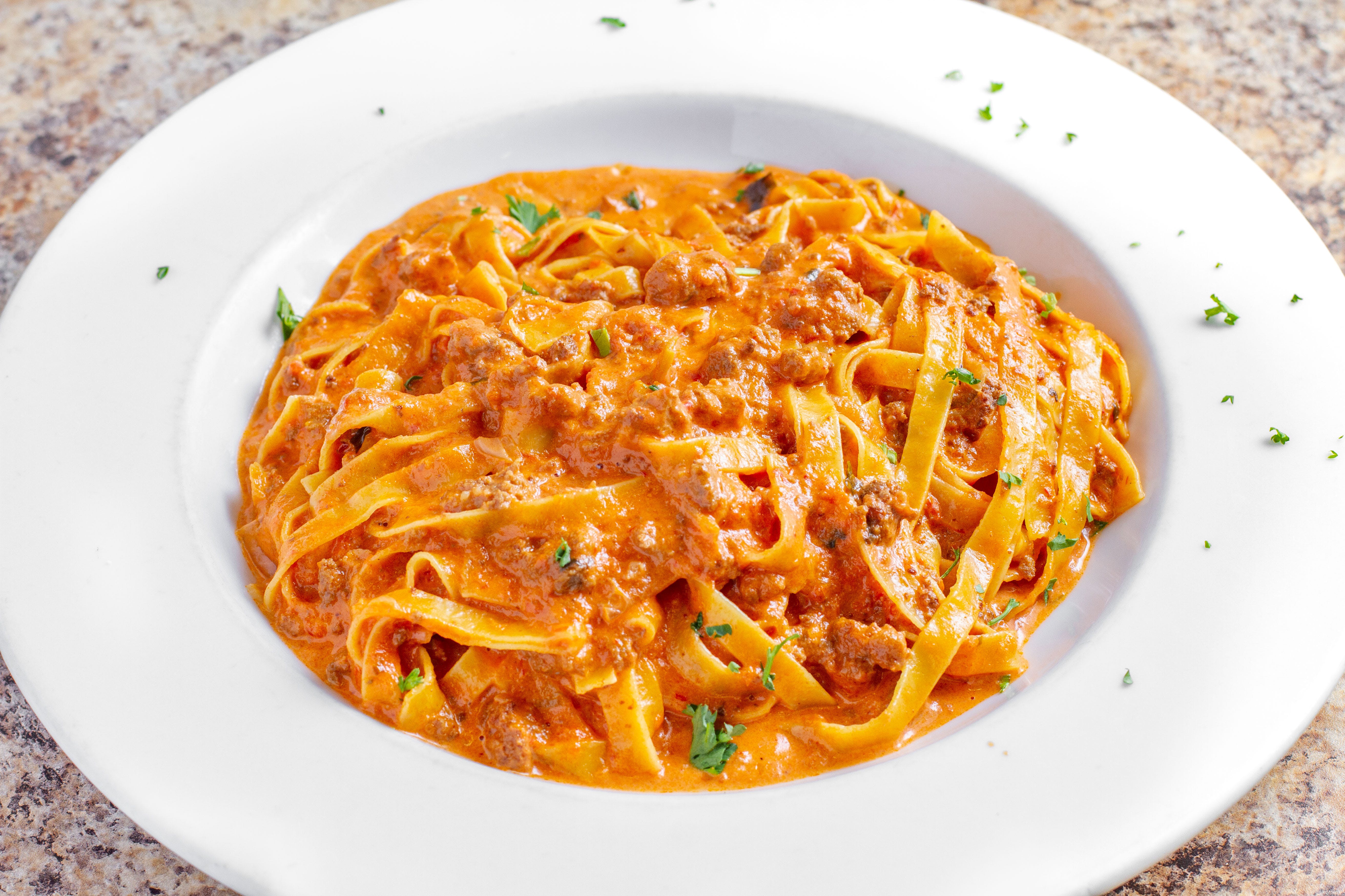 Order Fettuccine Bolognese - Pasta food online from Illiano J&P Restaurant store, Westminster on bringmethat.com