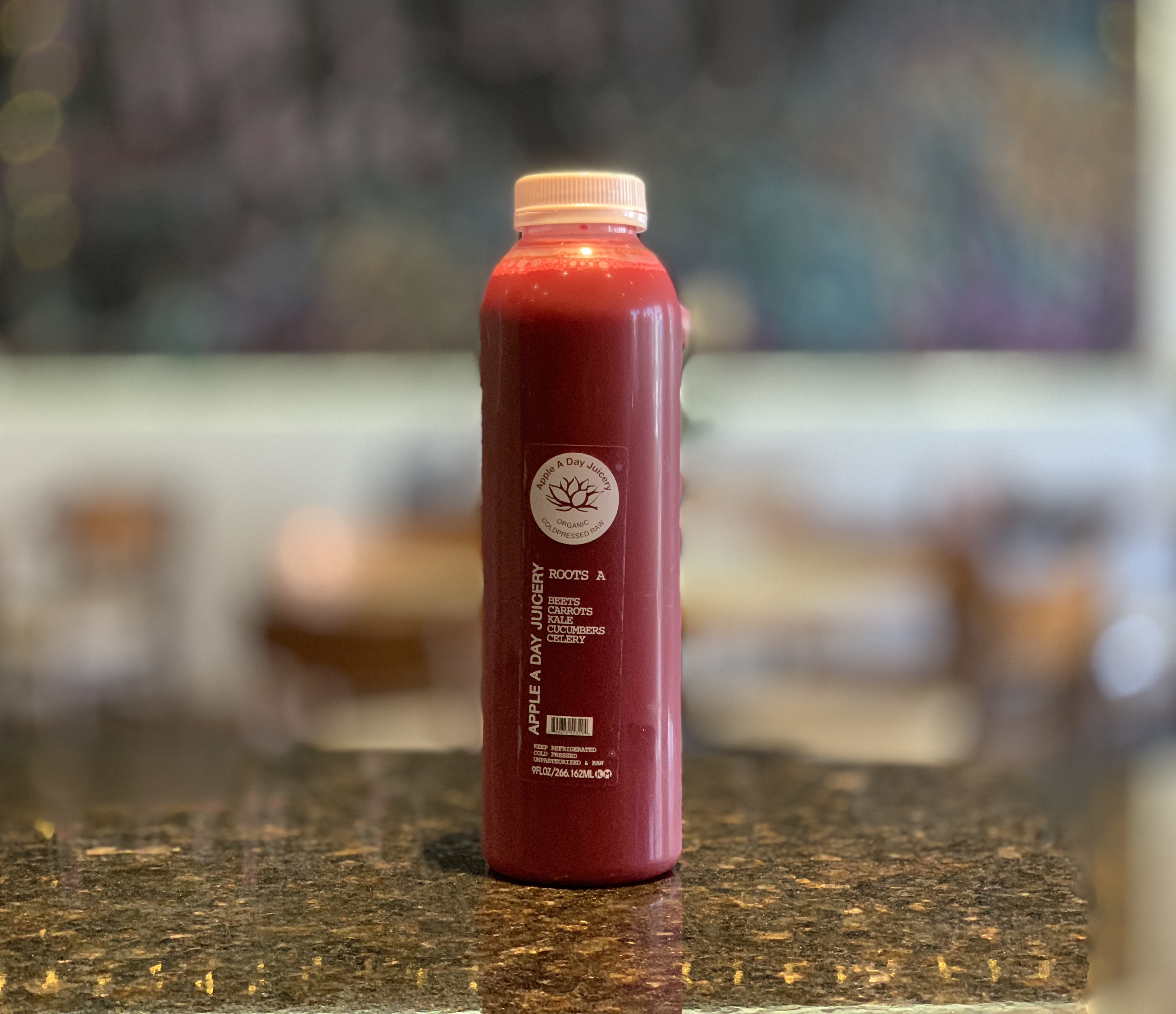 Order Roots A Juice food online from Apple A Day Cafe store, Miami Beach on bringmethat.com