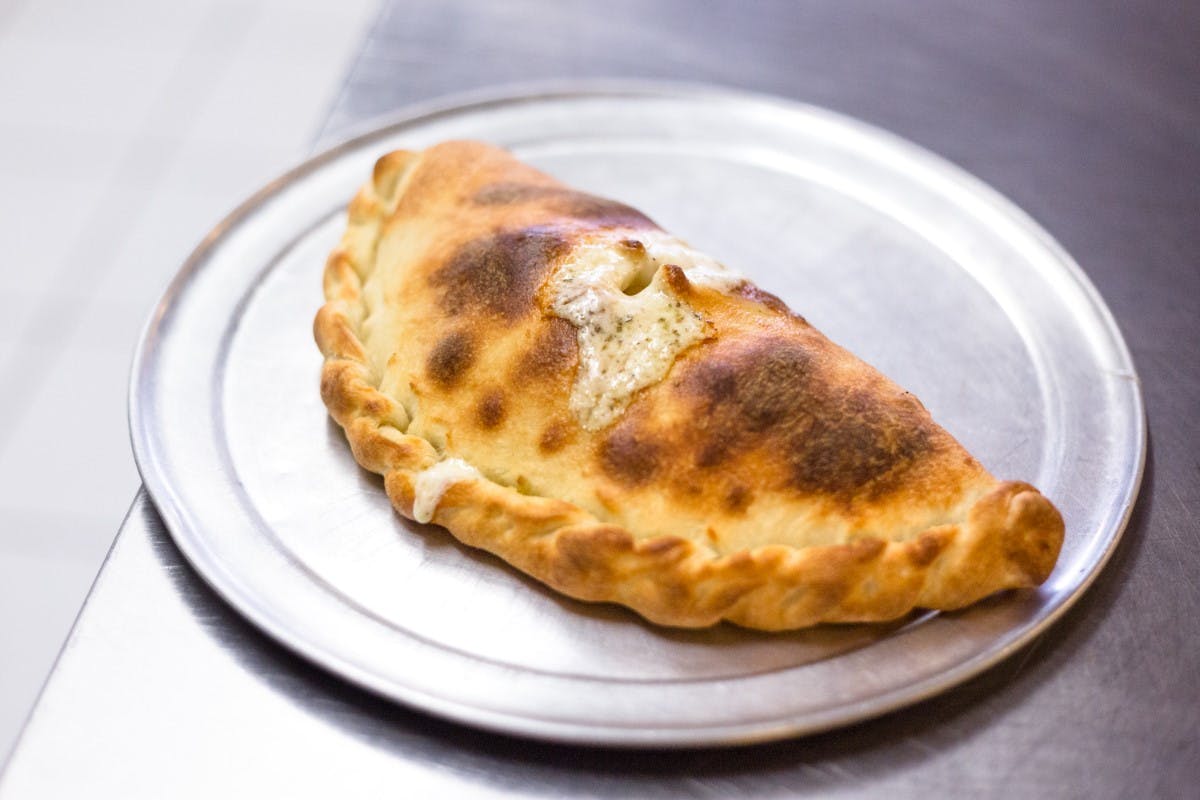 Order Napoli Calzone - Calzone food online from Brooklyn Pizza Denver store, Denver on bringmethat.com