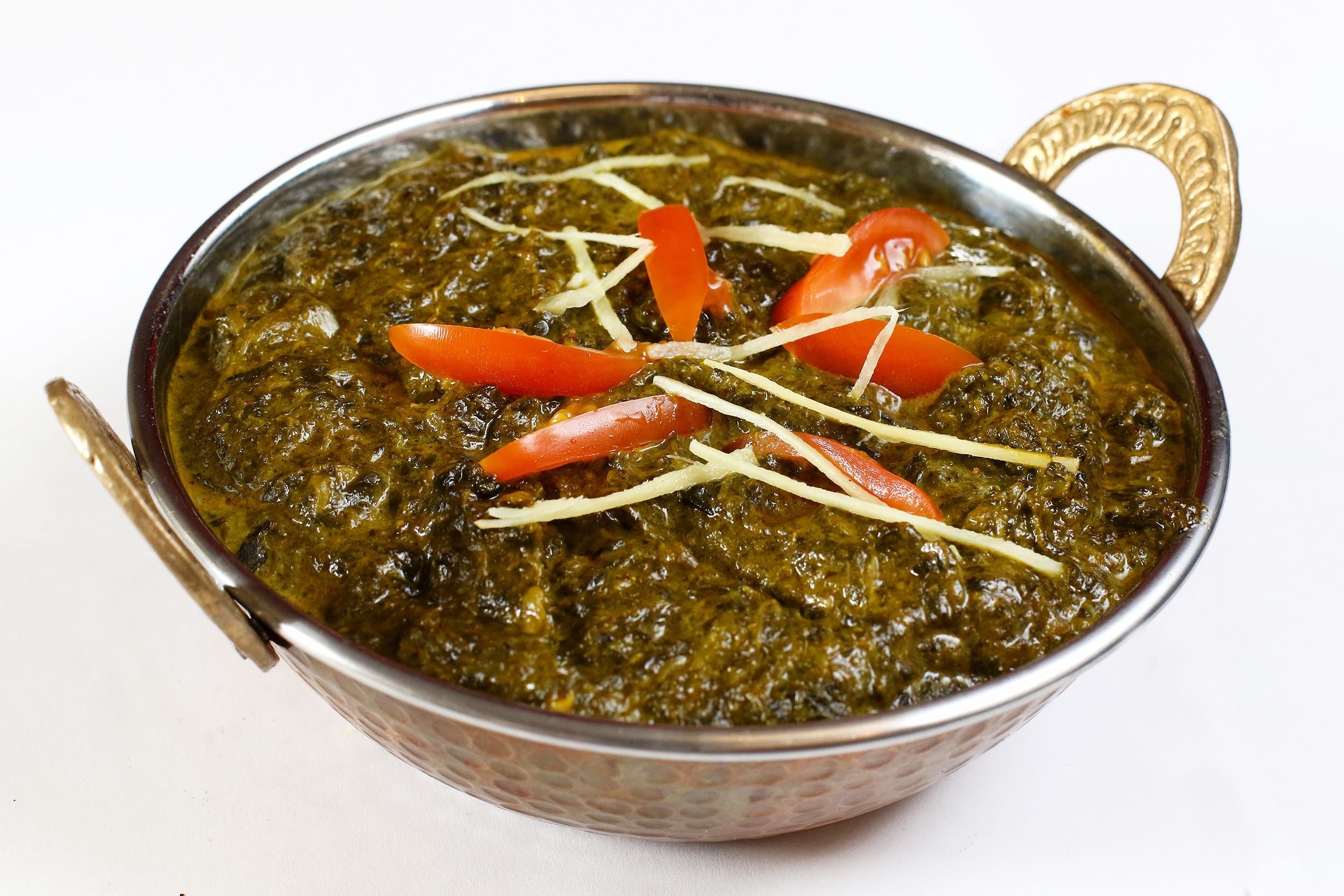 Order Lamb Saag Curry food online from Roti Roll store, San Francisco on bringmethat.com