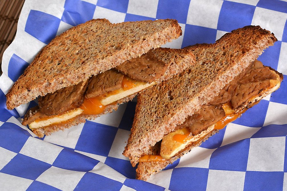 Order Vegan Bacon, Egg and Cheese Sandwich food online from Stella Blue Bistro store, Huntington on bringmethat.com