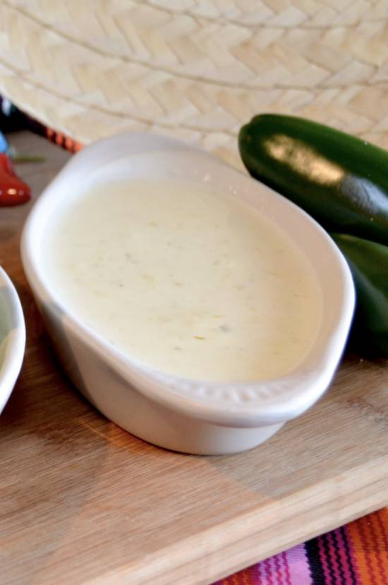 Order Queso (Dip) food online from Senor Iguanas store, Clarksville on bringmethat.com